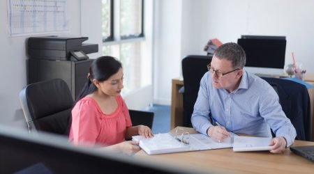 colleagues-reviewing-documents-in-an-office-settin-2024-07-10-00-09-47-utc